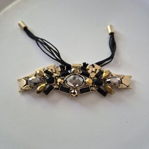 Elegant Gold and Black Bracelet